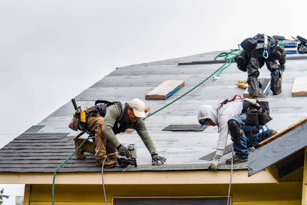 Professional Roofing technician working in Clifton, NJ